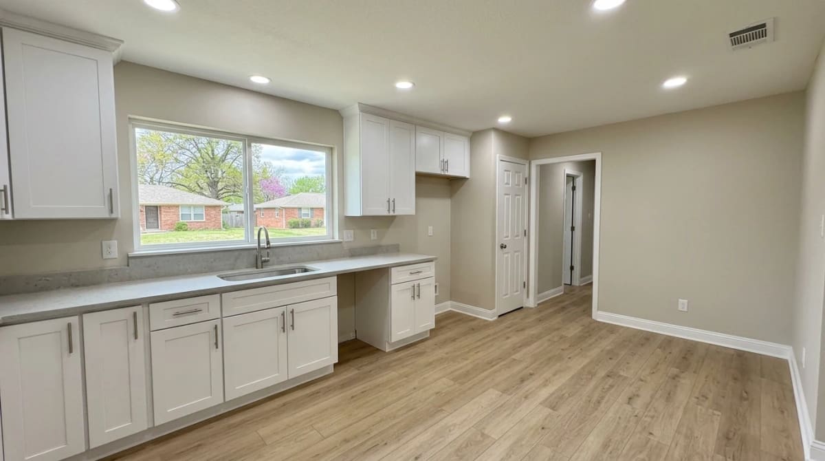 A finished kitchen and dining area