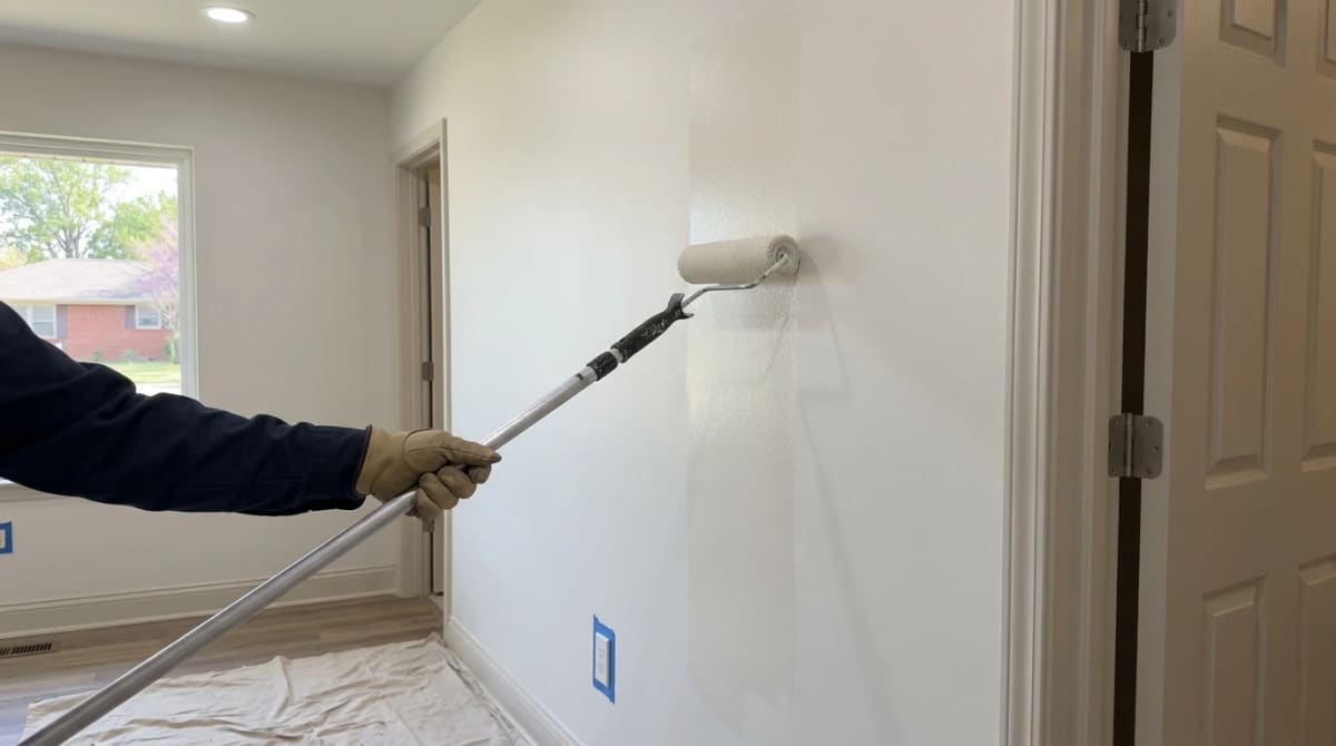 Rolling an even coat of paint